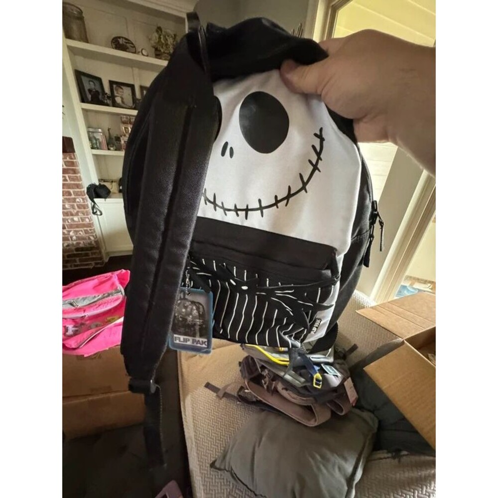 Reversible nightmare before Christmas backpack new with tags, but stained